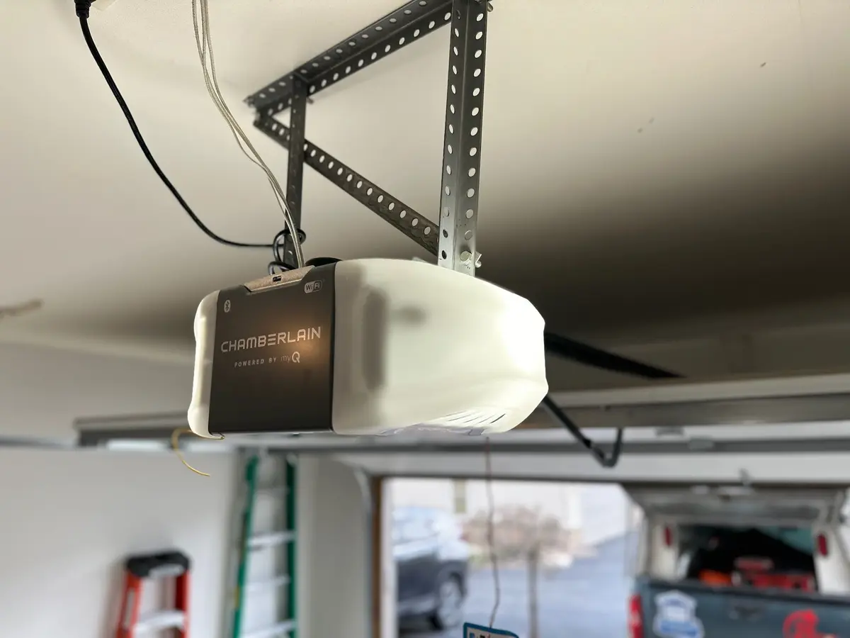 Chamberlain garage door opener mounted on a garage ceiling