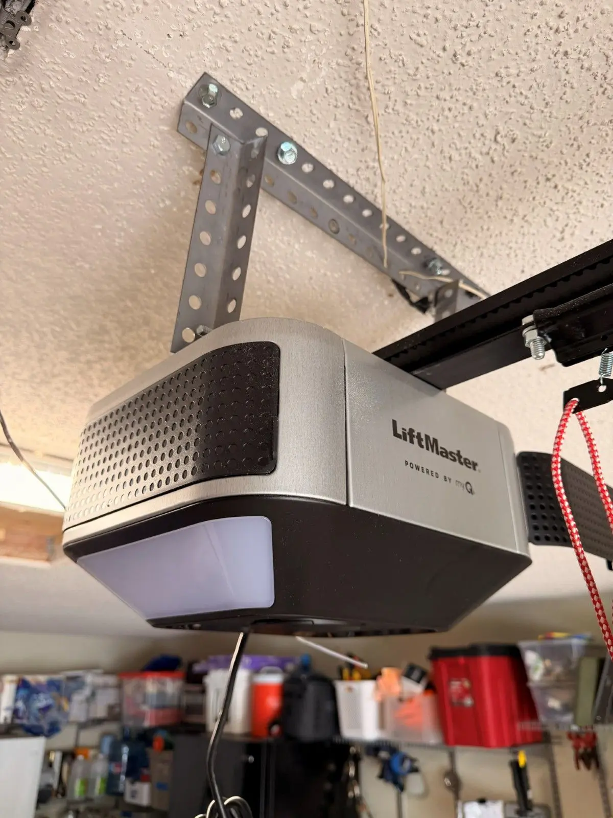 LiftMaster garage door opener with built in LED lighting on a garage ceiling